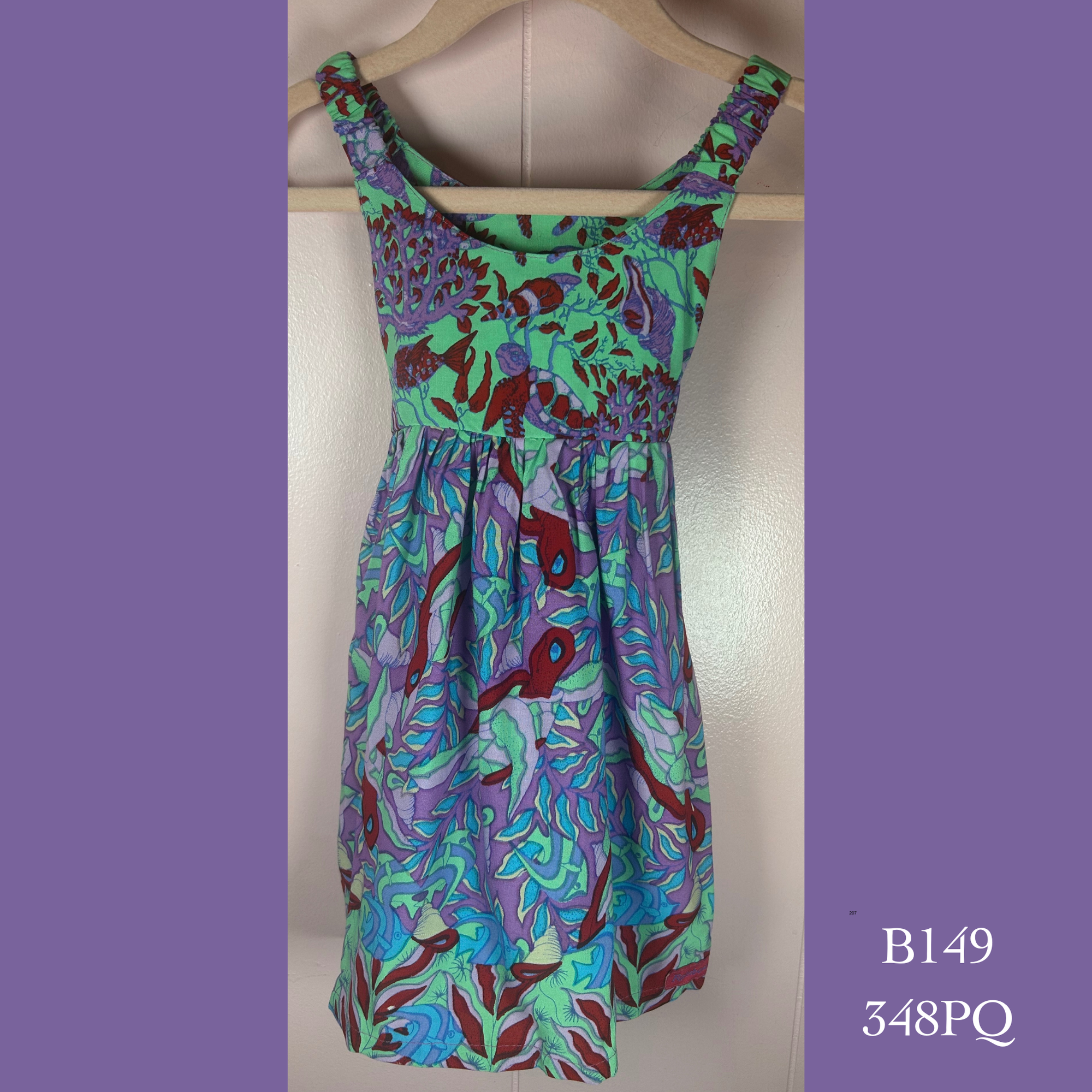 B149 - 348PQ , Elastic strap baby doll dress