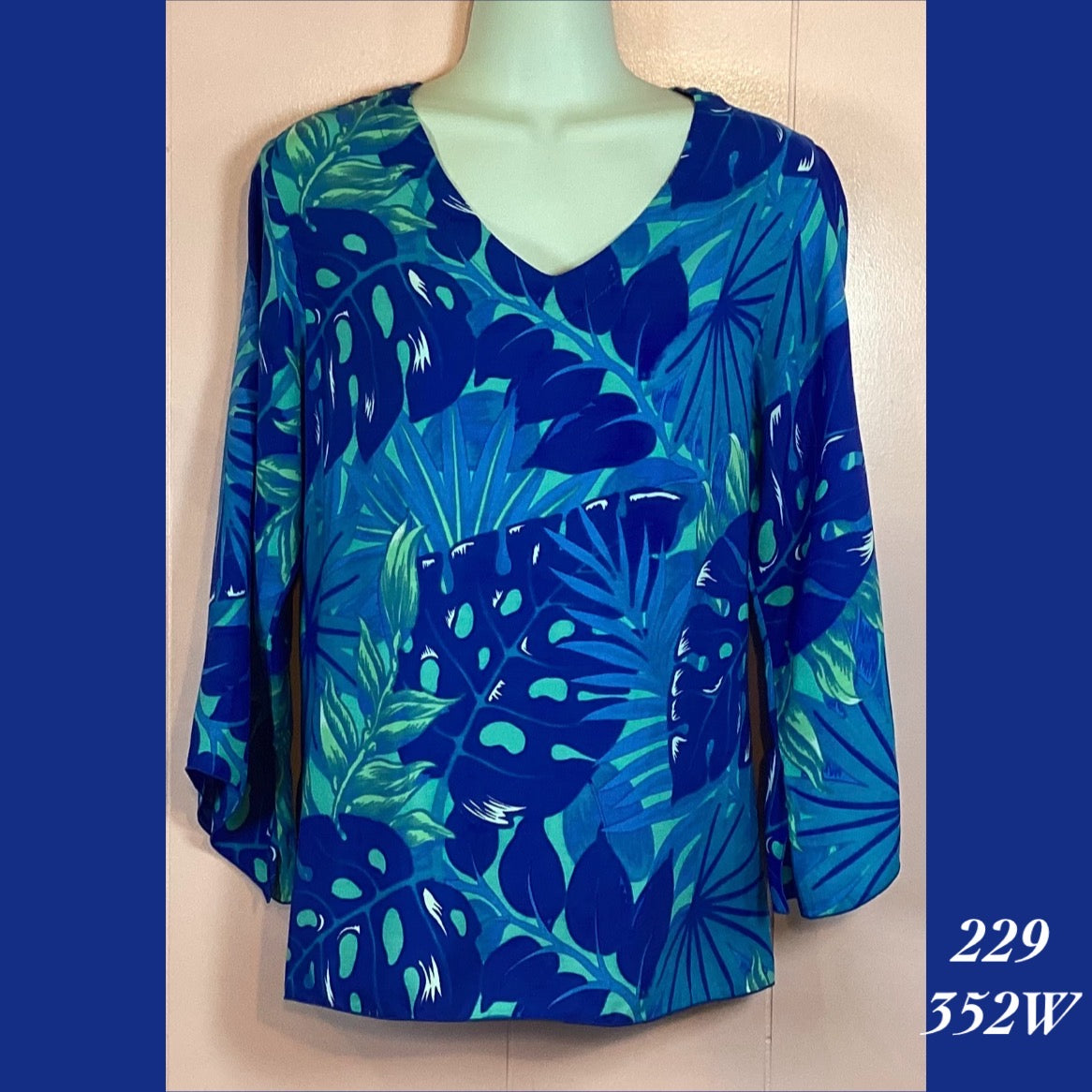 229 - 352W , V neck tunic top with 3/4 sleeve