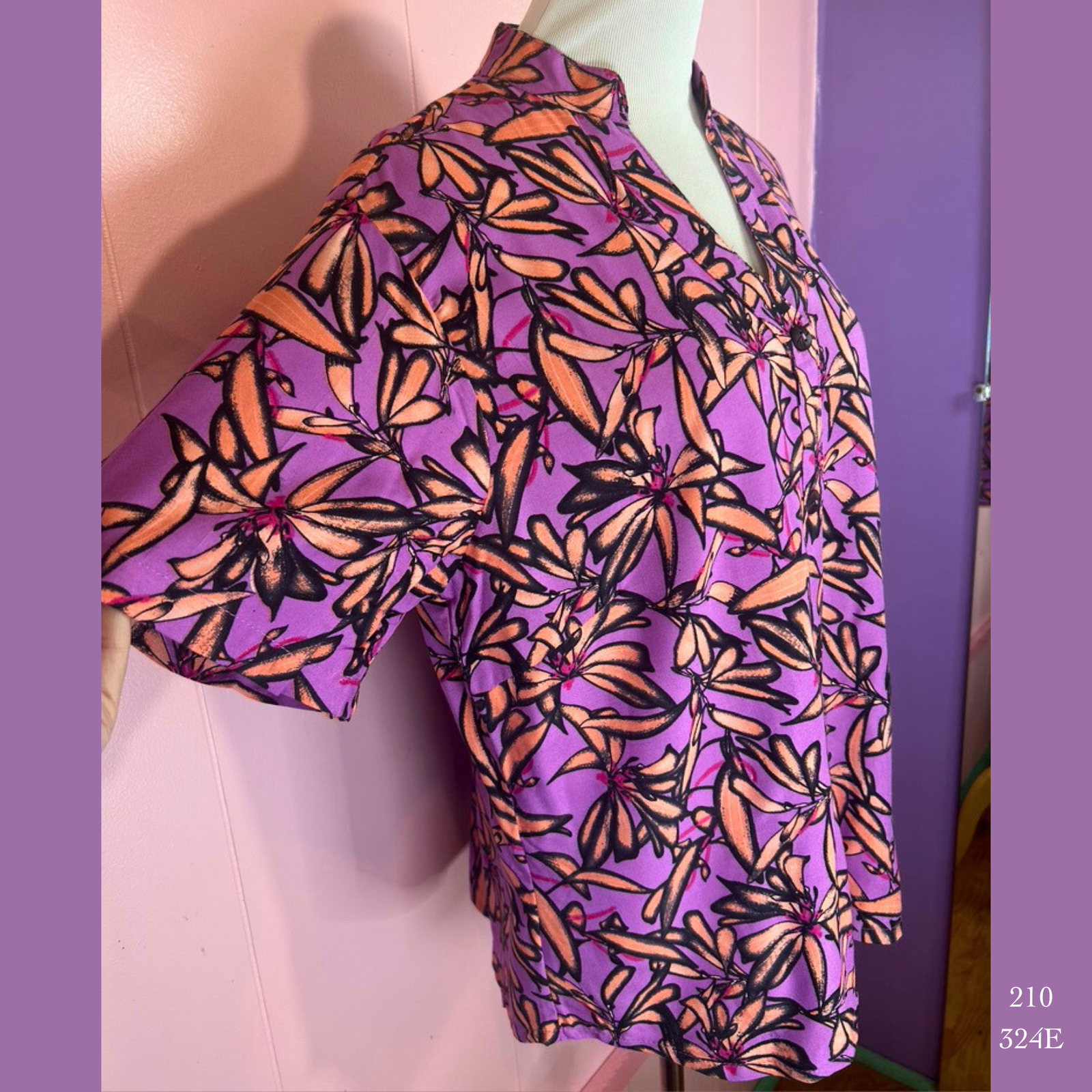 210 - 324E ,  Resort collar button blouse