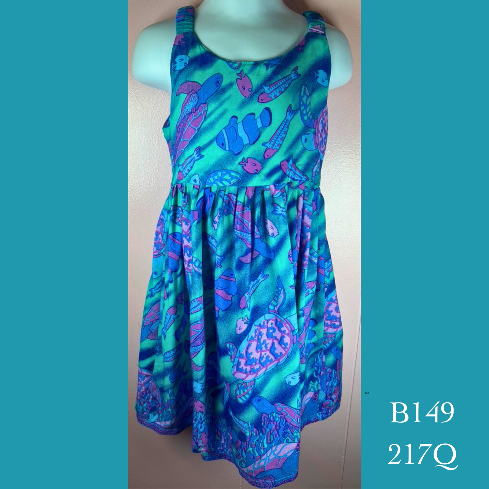B149 - 217Q , Elastic strap baby doll dress